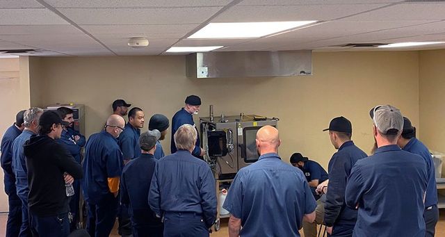Two Man Installing Refrigerator — Commercial Refrigerator Repairs in Colorado Springs, CO Two Man Installing Refrigerator — Commercial Refrigerator Repairs in Colorado Springs, CO