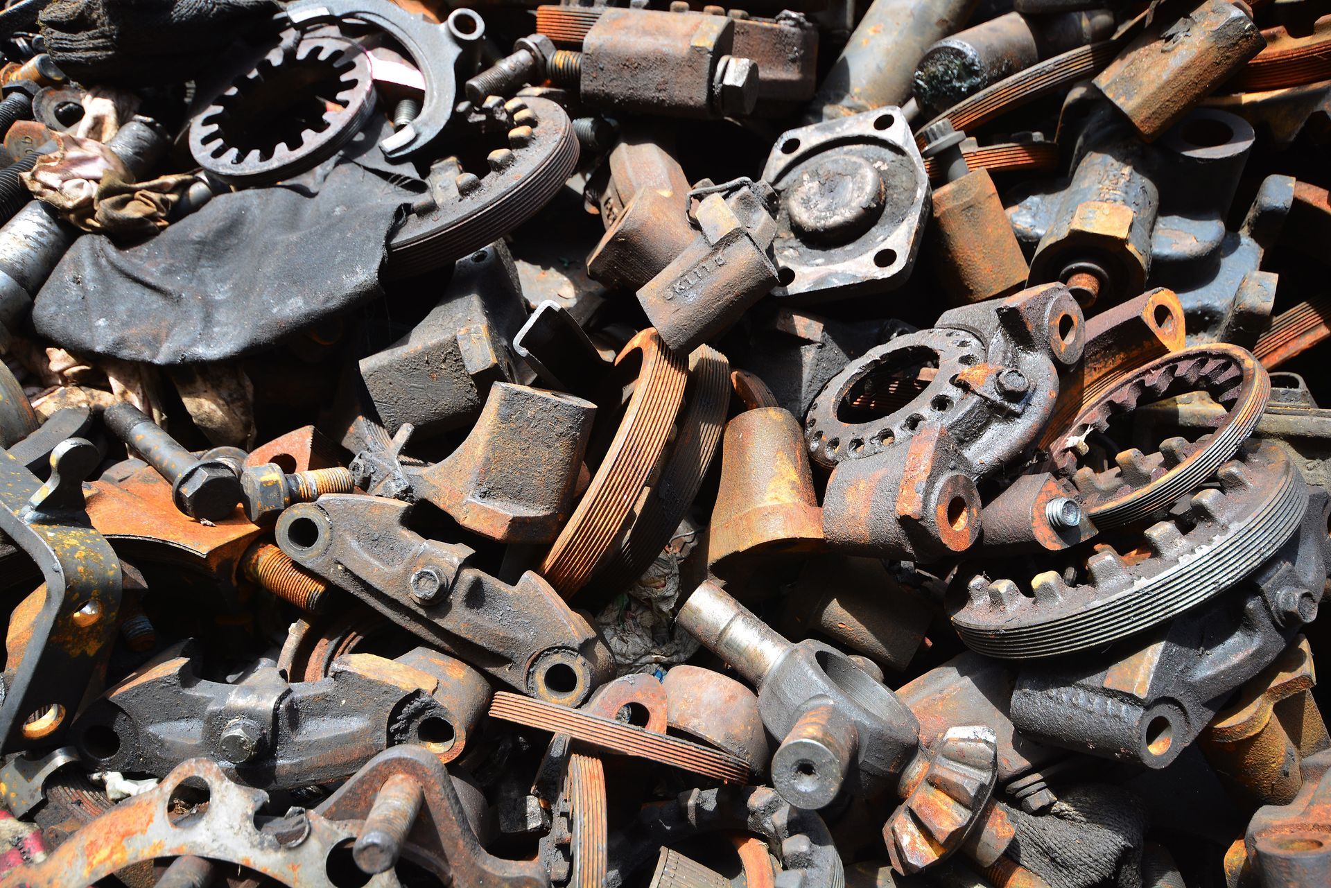 A pile of mechanical scrap metal components.