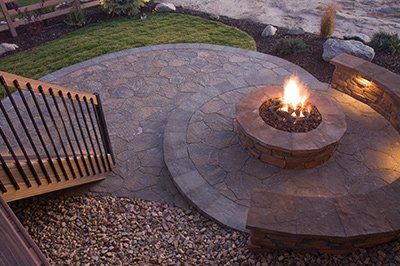Natural finish, penetrating sealers repel liquids to protect courtyard stone pavers.