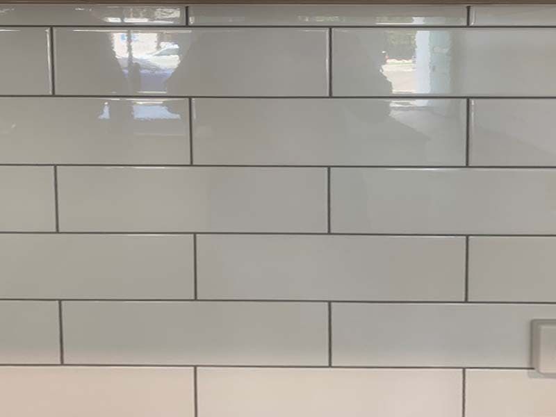 A Close Up of a White Subway Tile Wall — The Tile & Stone Specialists in Peregian Beach, QLD