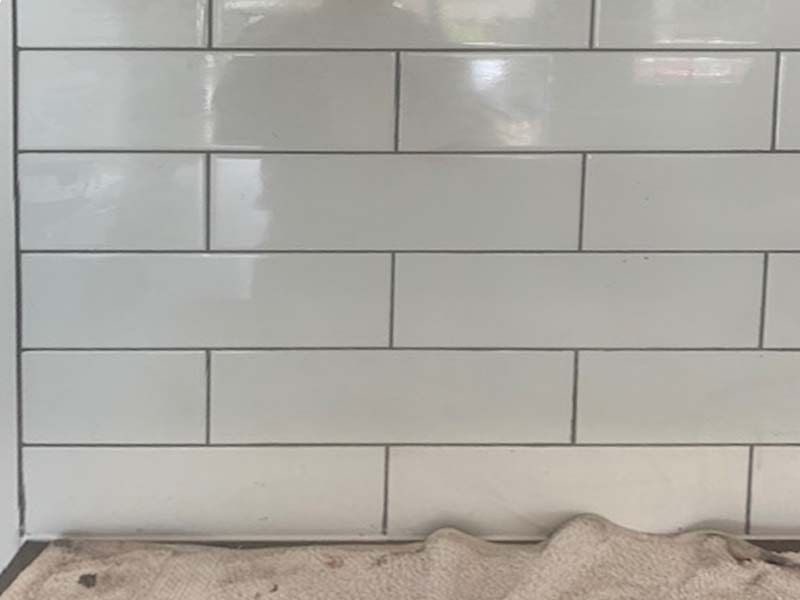 A Close Up of a White Subway Tile Wall — The Tile & Stone Specialists in Peregian Beach, QLD