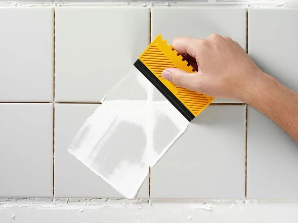 Man Doing Tile Sealing in Coastal Homes