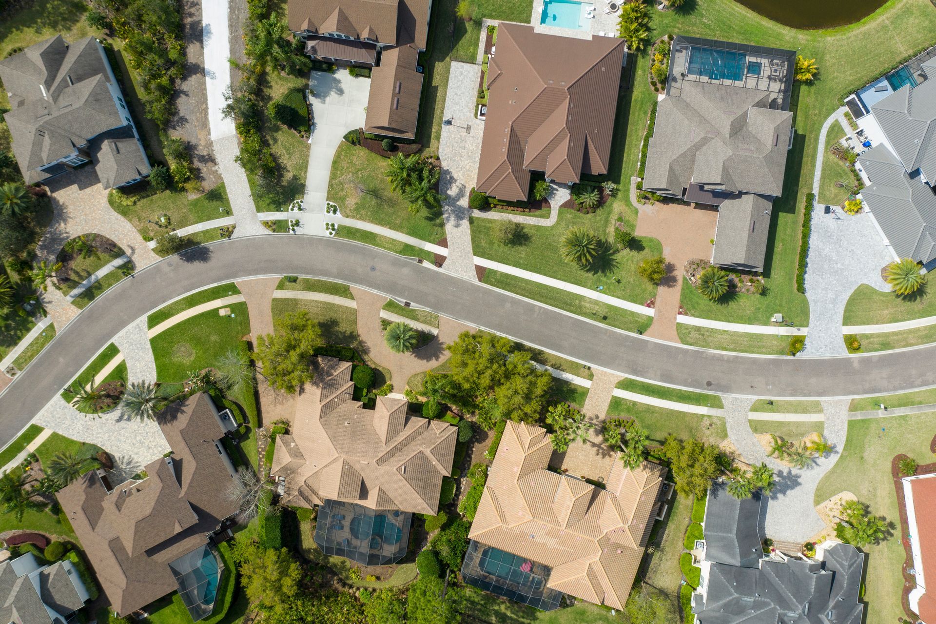 An aerial view of a residential neighborhood with lots of houses