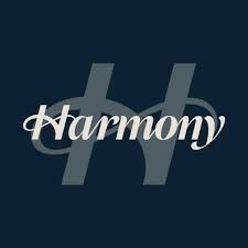 White “Harmony” script over a dark blue background with a stylized gray H logo