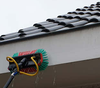 Exterieurreiniging van dakrand en gevel met telescoopsysteem