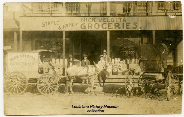 A black and white photo of rick velocta 's family groceries