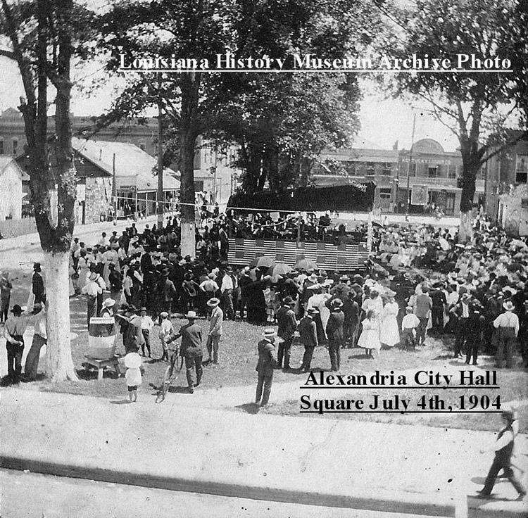 A black and white photo of alexandria city hall square