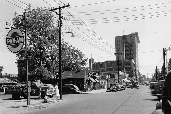 A black and white photo of a panam gas station