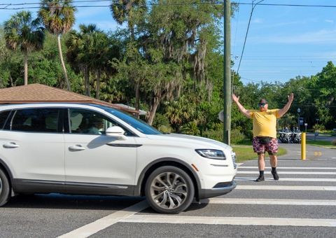 Person trying to cross the road