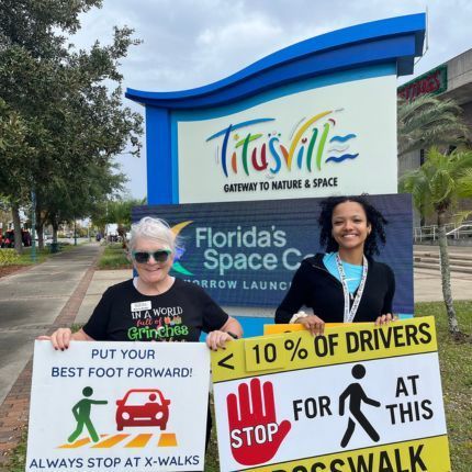 Best Foot Forward Sign Waving Titusville