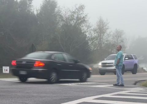 Person trying to cross the road