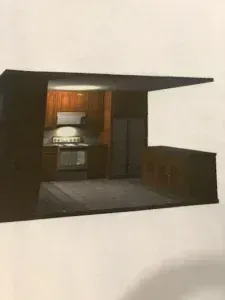 Small modern kitchen interior with dark cabinets, warm lighting, and a large open front deck.