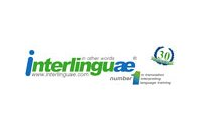 Logo di Interlingua con un globo verde e il numero 60 su sfondo bianco.