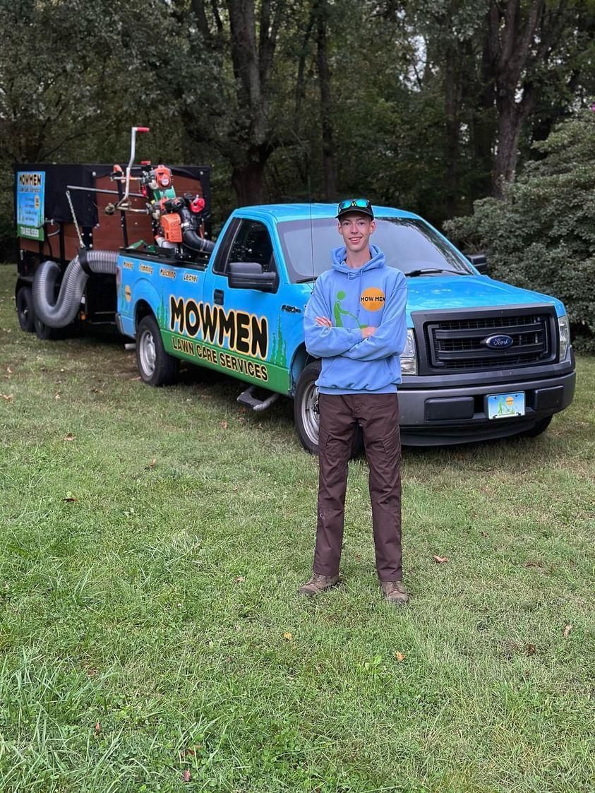 Mowmen truck and lawn Equipment with the owner of the business