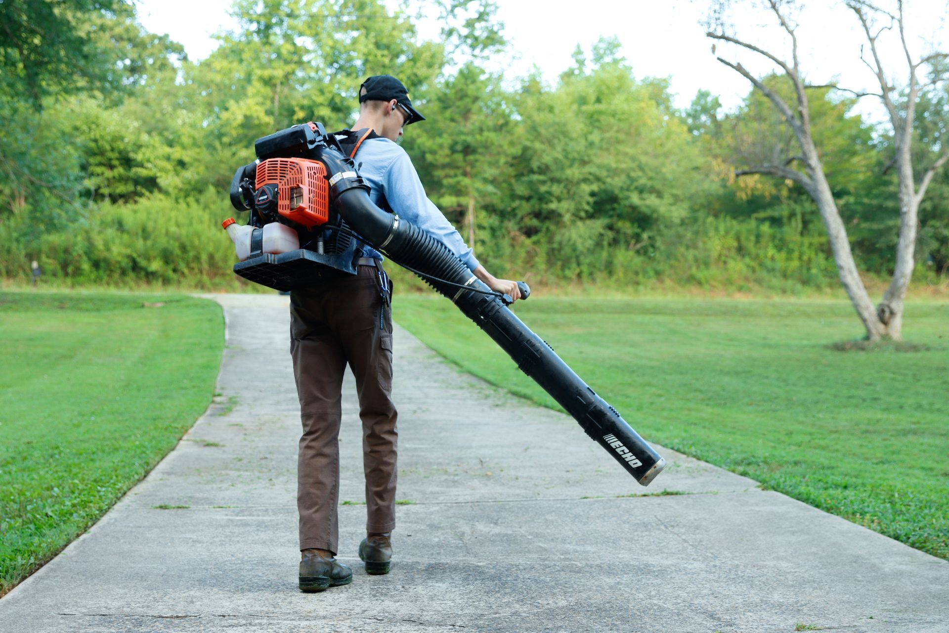 unloading a riding lawn mower