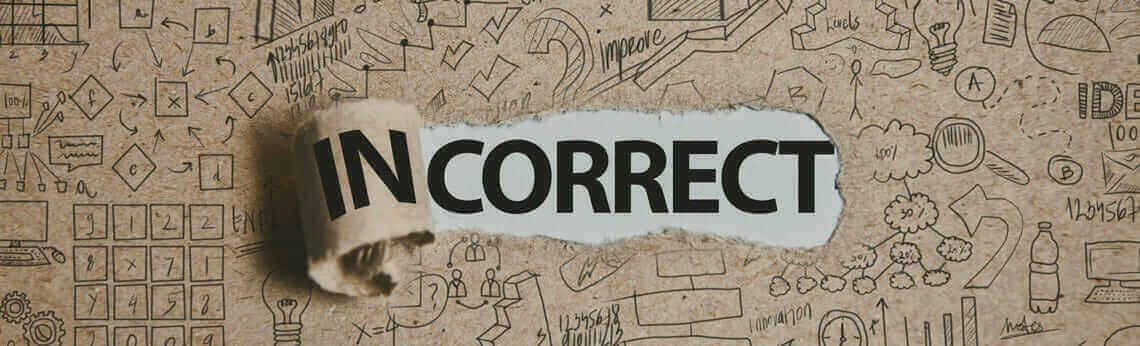 Torn paper revealing the word