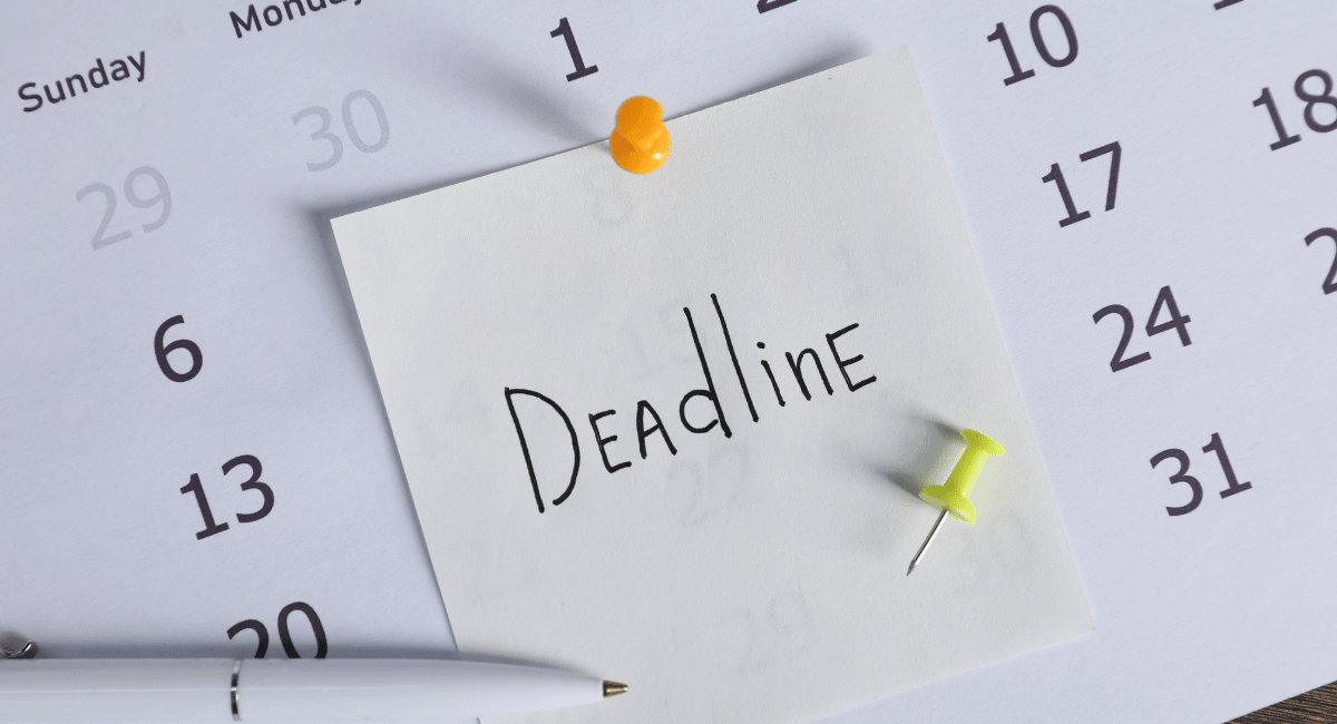 image of a calendar with a deadline post it note