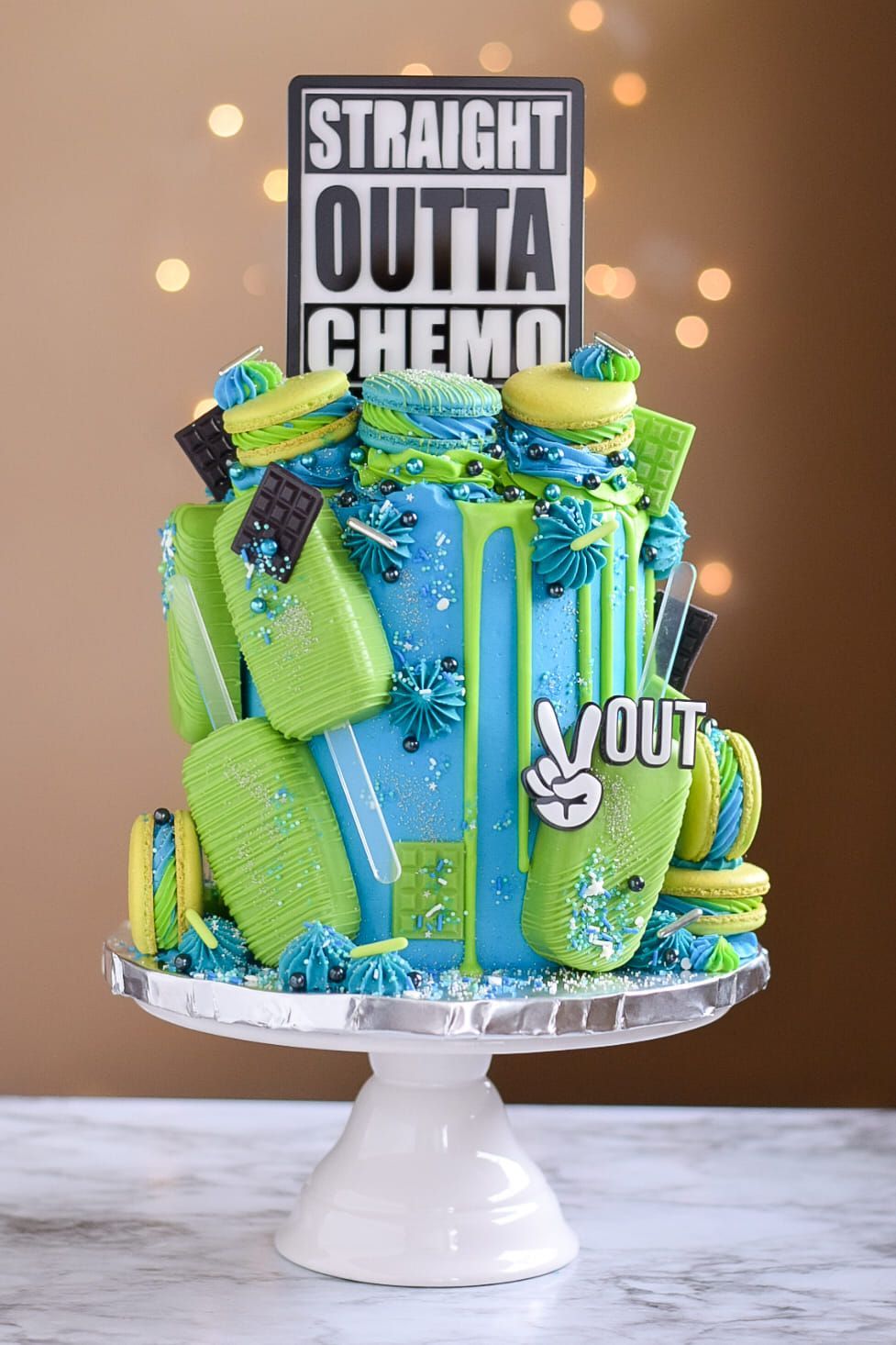 Cake decorated in blue and green, with 