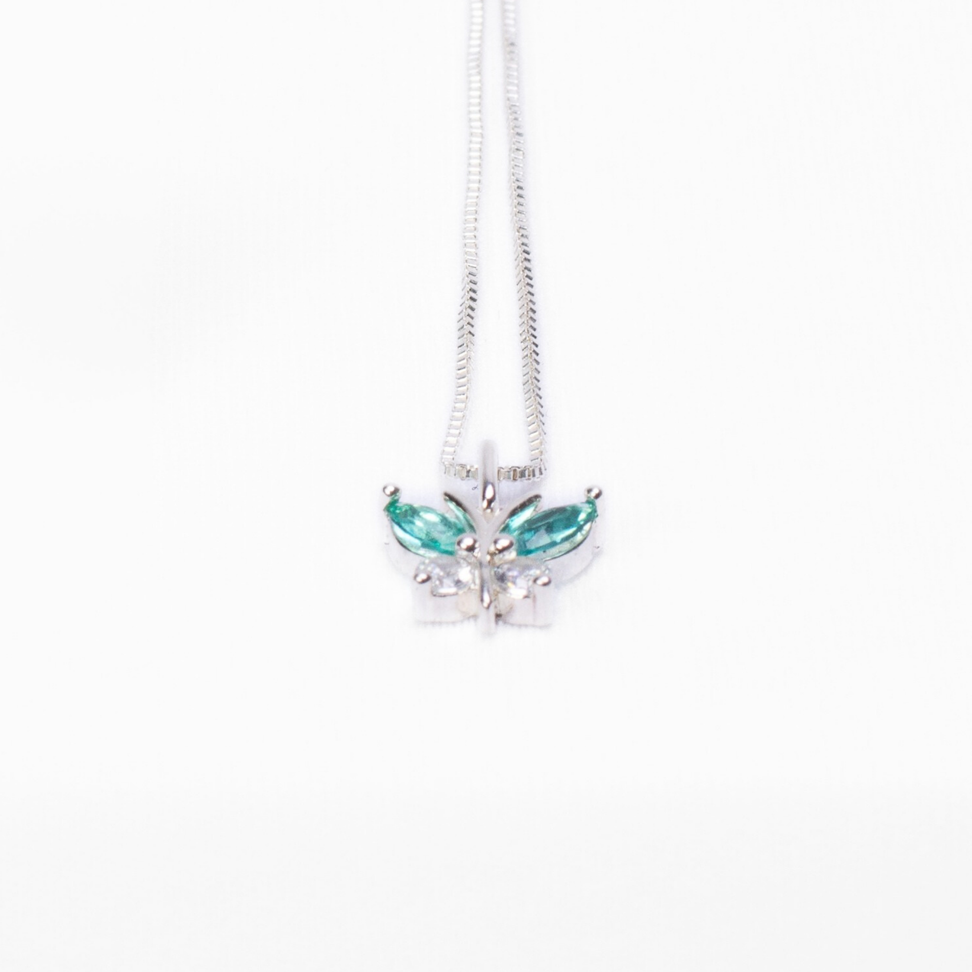 Butterfly Pendant with Blue Topaz and Zirconia