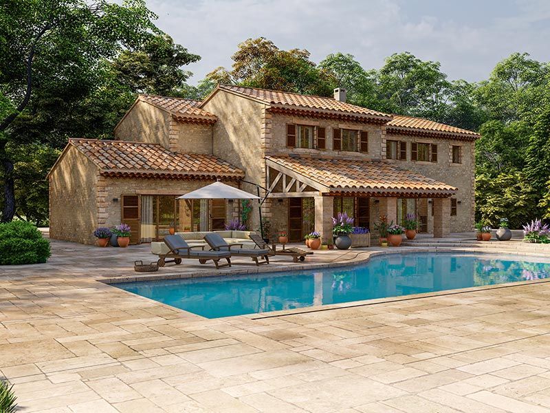 A large house with a swimming pool in front of it
