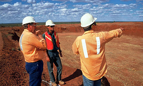 Workers at Construction Site — Birmingham, AL — Southeastern Surveyors Workers at Construction Site — Birmingham, AL — Southeastern Surveyors