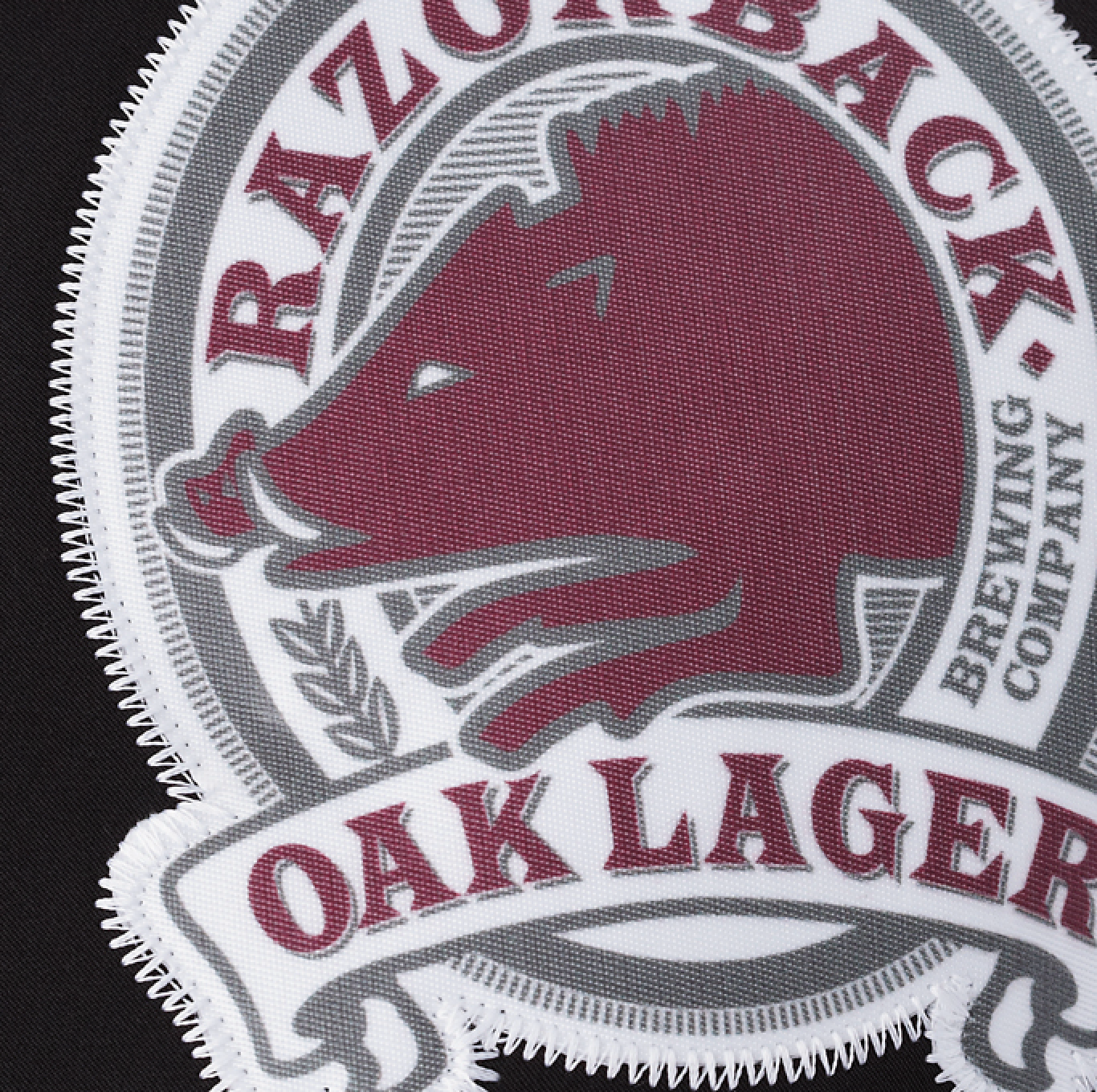 A logo for razorback oak lager brewing company