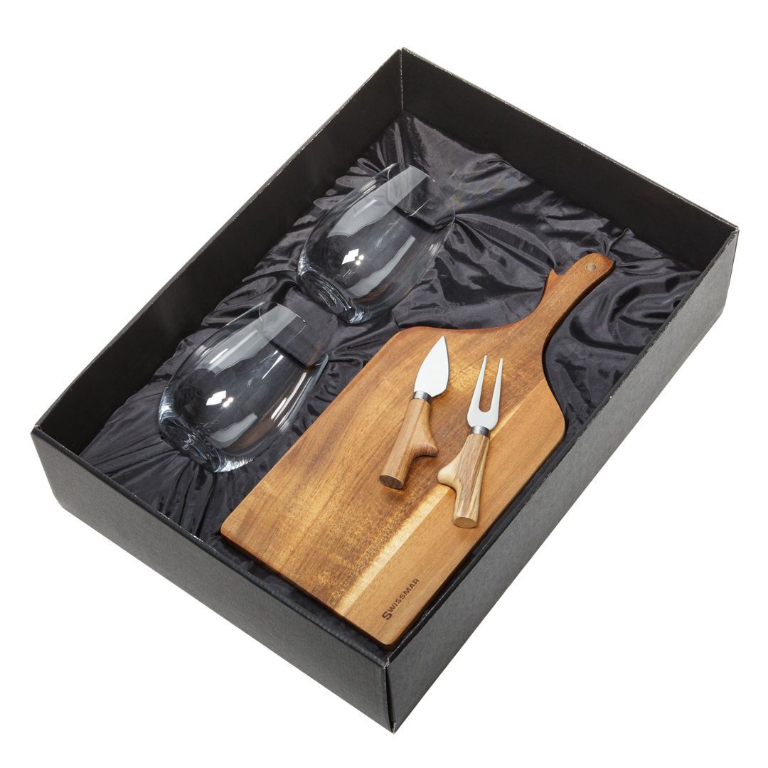 A wooden cutting board with knives and glasses in a box