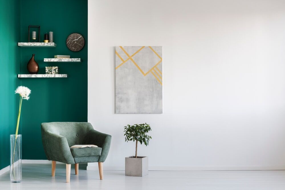 Interior Painting With A Sofa, A Plant and Decorations on Left Side — Painting service in Yeppoon, QLD