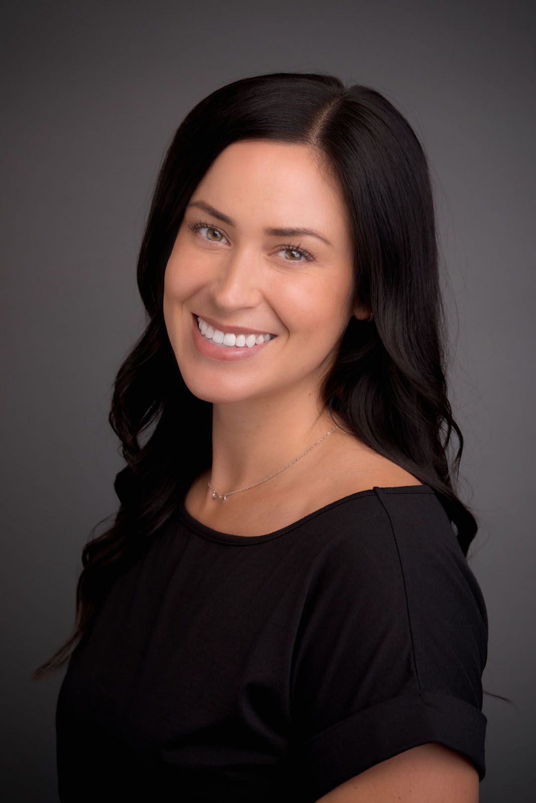 Headshot of Lauren Caliz of G. B. group Inc