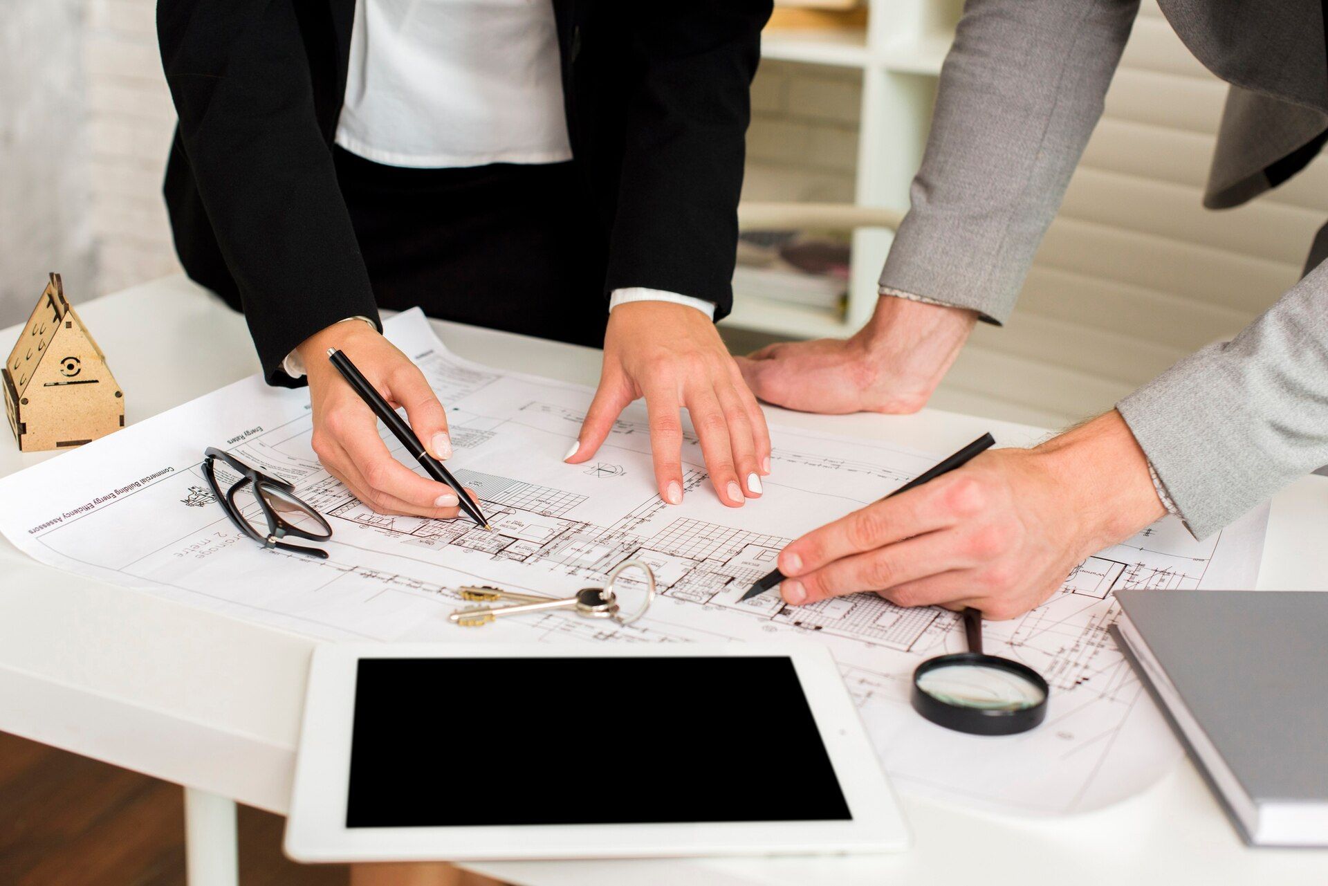 Two Litigators looking over documents 