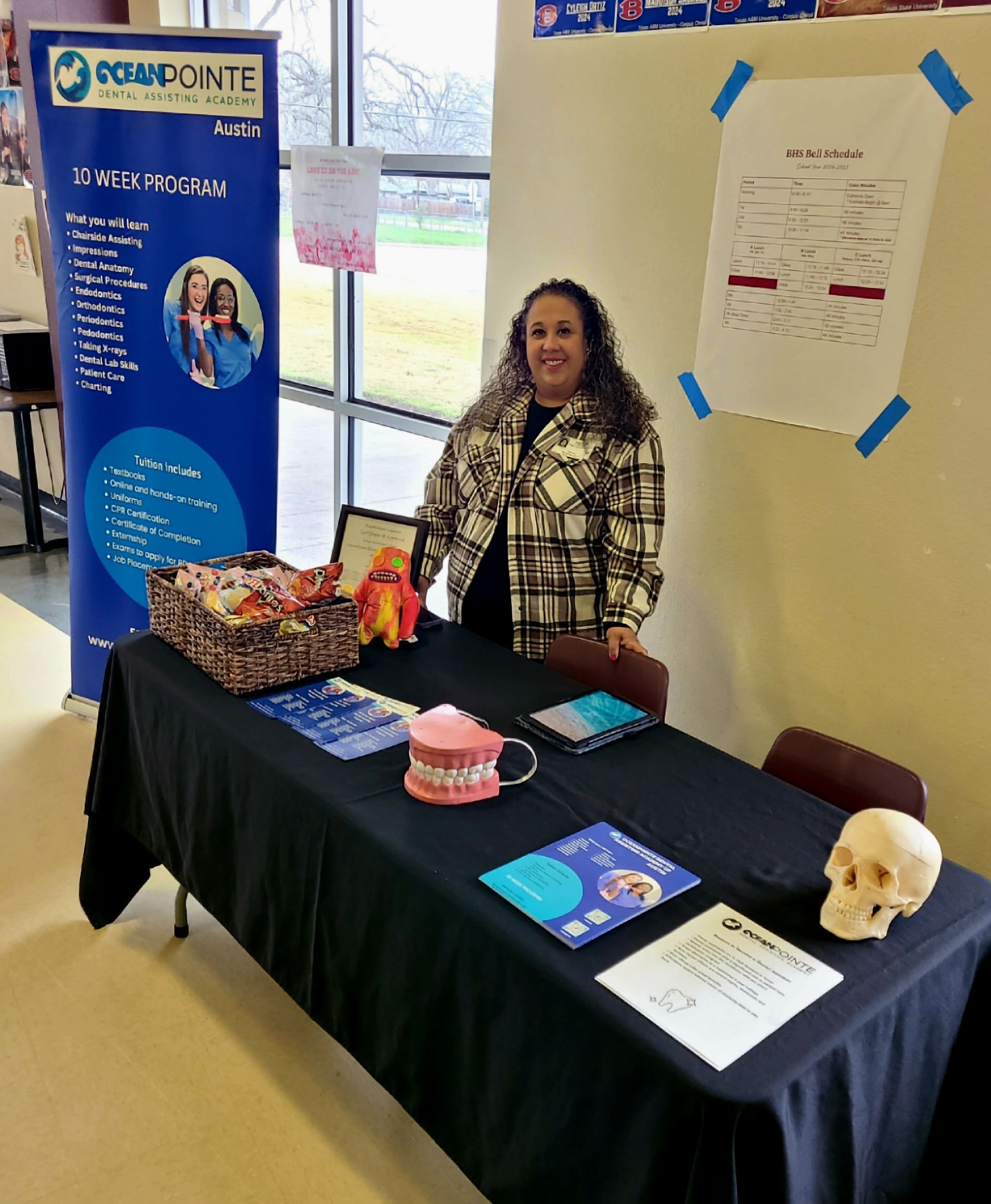  Dental assisting instructor at community event.