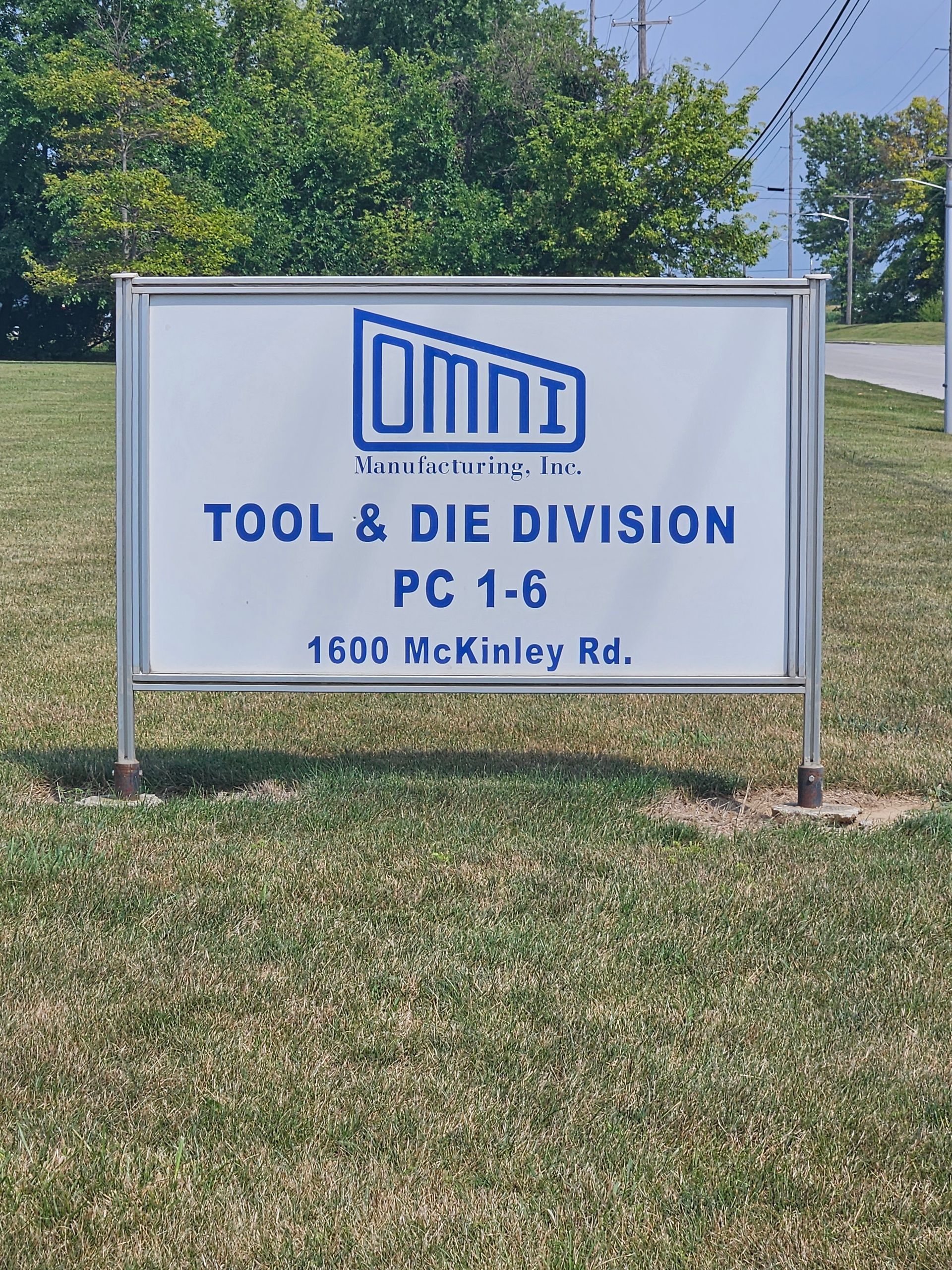 A sign for omni tool and die division pc 1-6