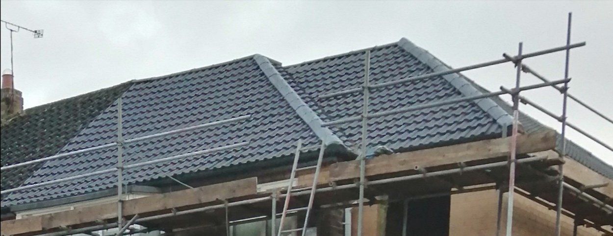 Picture of a residential roof being fitted to a new build domestic property by Roofers Nottingham