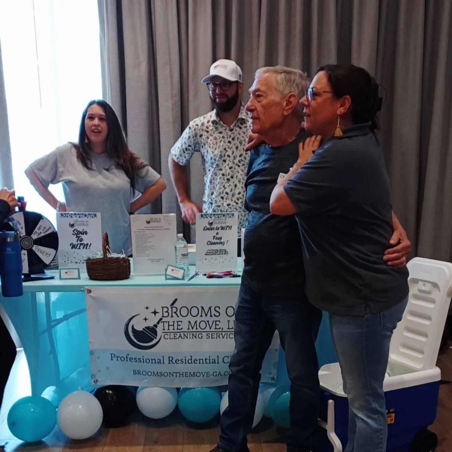 People at a booth for 