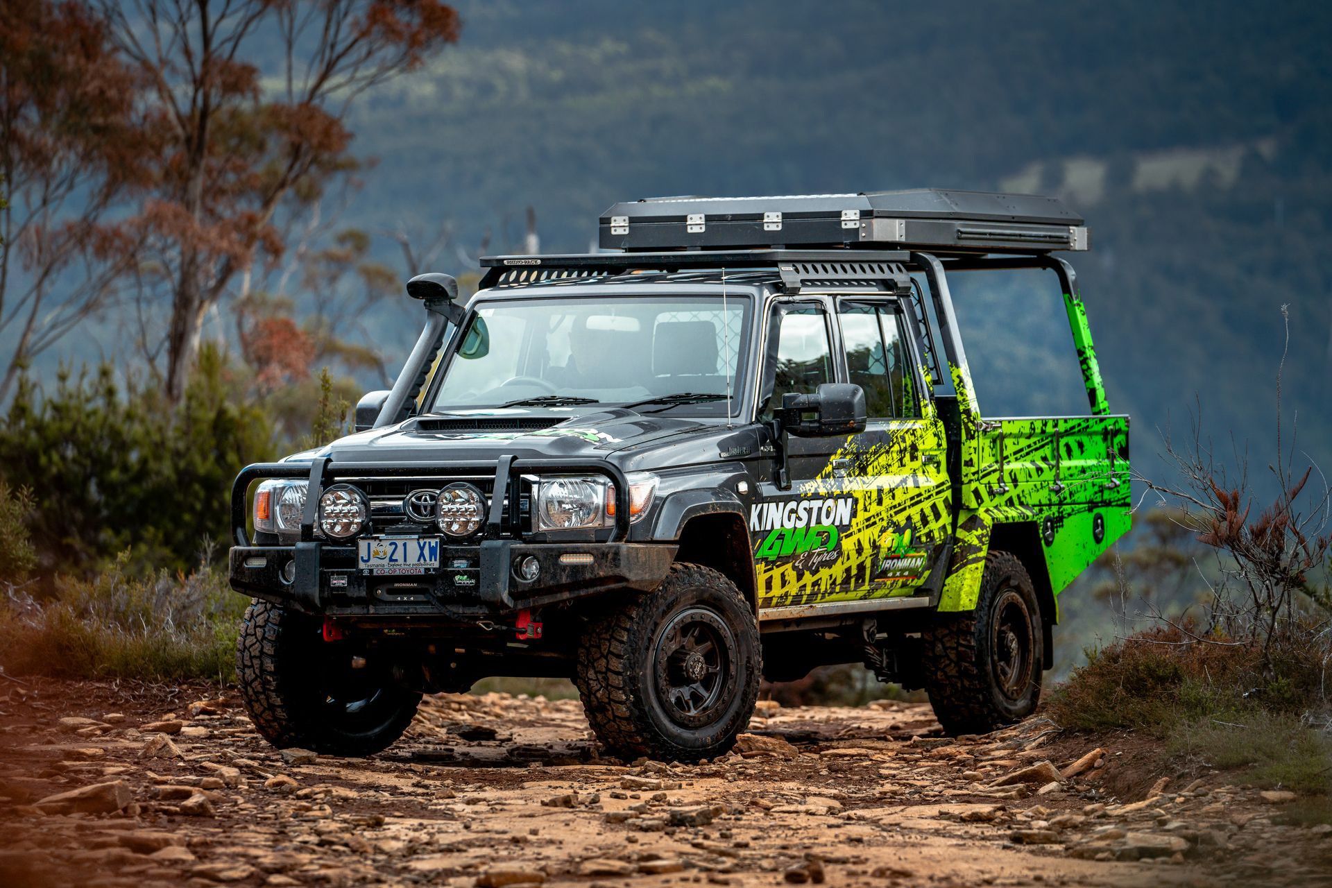 Two Off-road SUVs, ONE Black and ONE Neon Green — Kingston 4wd and Tyres In Huntingfield, TAS