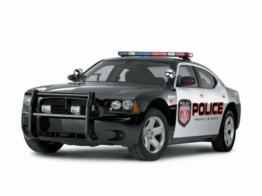 A black and white police car on a white background