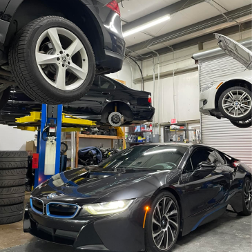 Vehicles inside of our auto repair shop | EuroWorks