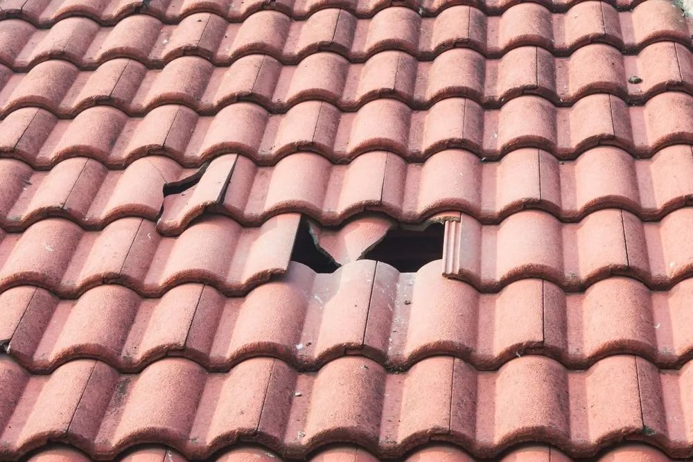A Close Up of a Roof With a Hole in It — Roofpoint In Kawungan, QLD