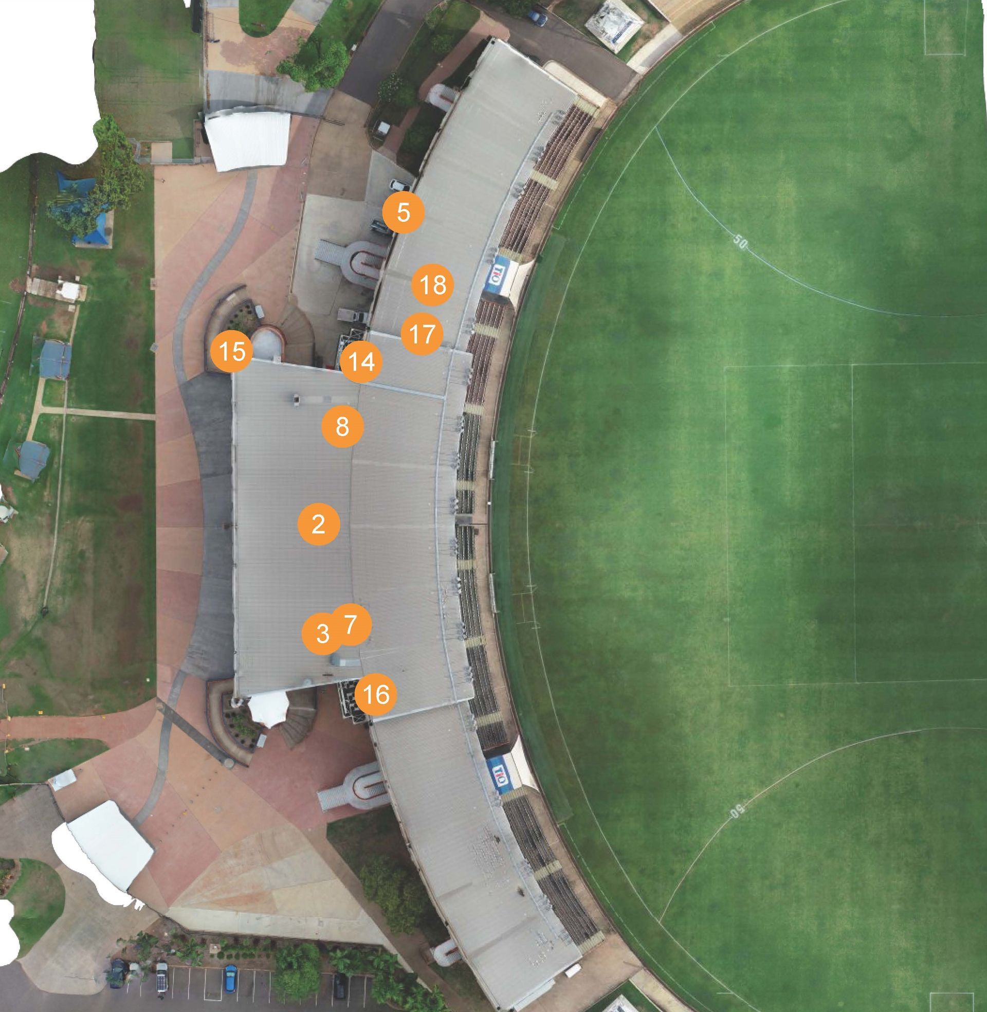 An aerial view of a stadium with annotated mark ups for infrastructure inspection.