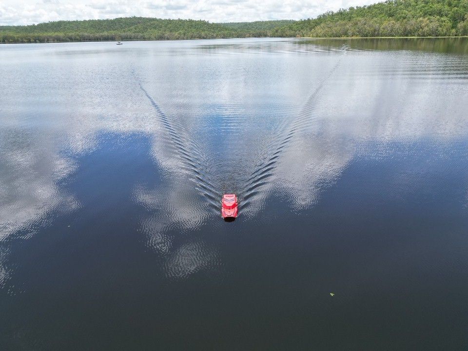 Rise's bathymetric USV surveying a large water reservoir in the Northern Territory.
