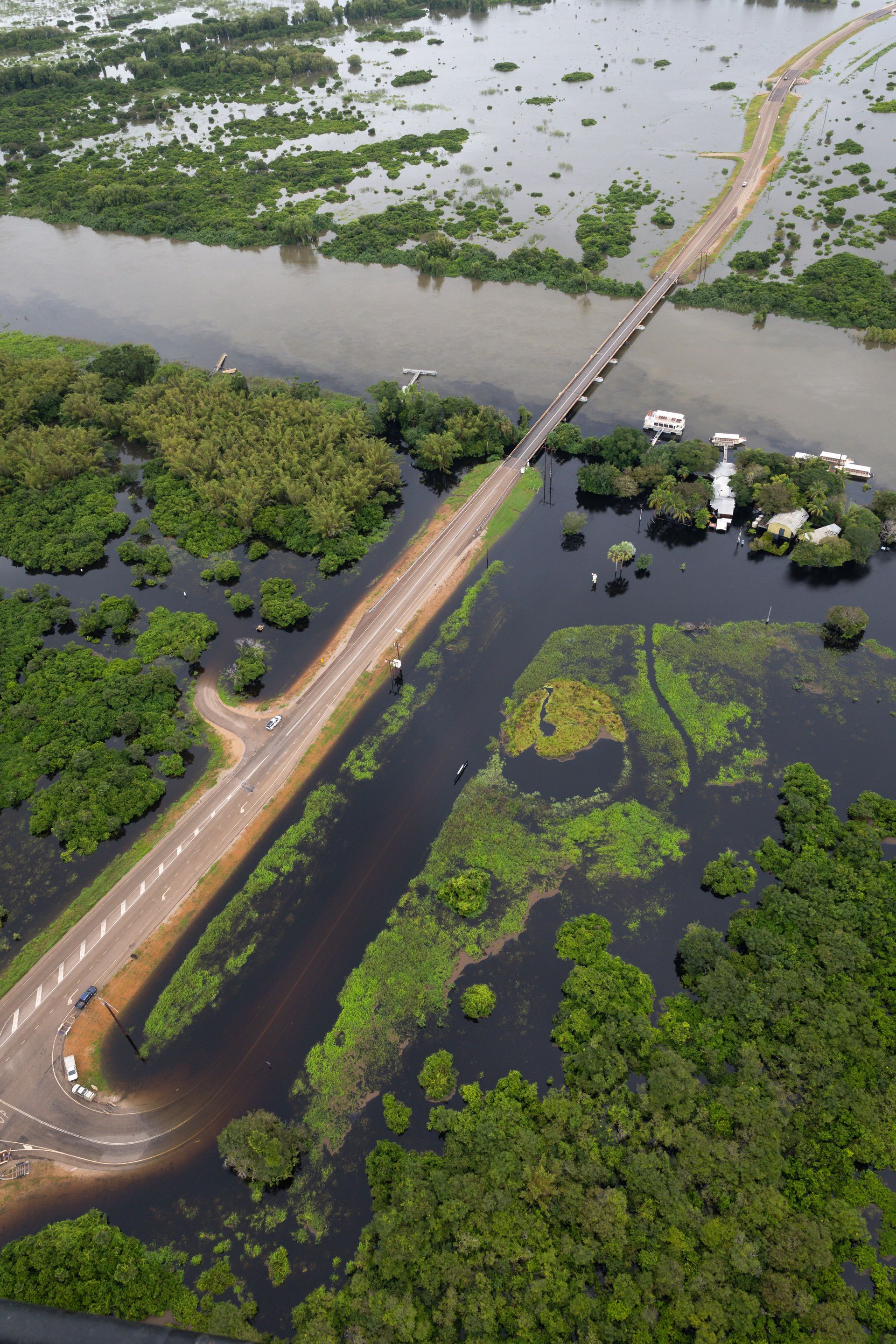 Aerial view of flooded river in NT during disaster assessments.