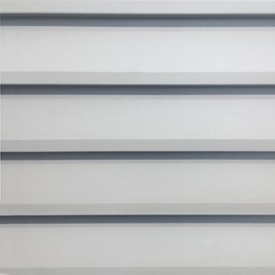 Horizontal rows of white paneling with shadows.