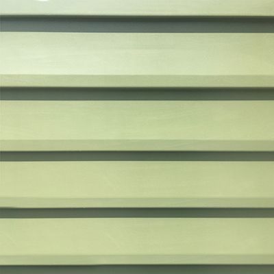 Tan horizontal corrugated metal siding.