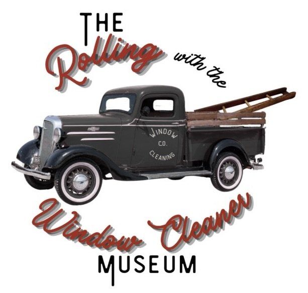 Logo for The Rolling with the Winder Cleaner Museum, featuring a black vintage pickup truck with a ladder rack