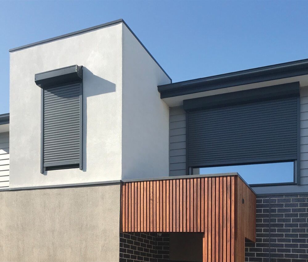 A Close Up Of A Roller Blind On A Window — Mid Coast Flooring & Blinds In Wingham, NSW