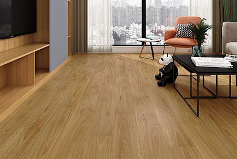 A Living Room With A Wooden Floor — Mid Coast Flooring & Blinds In Taree, NSW