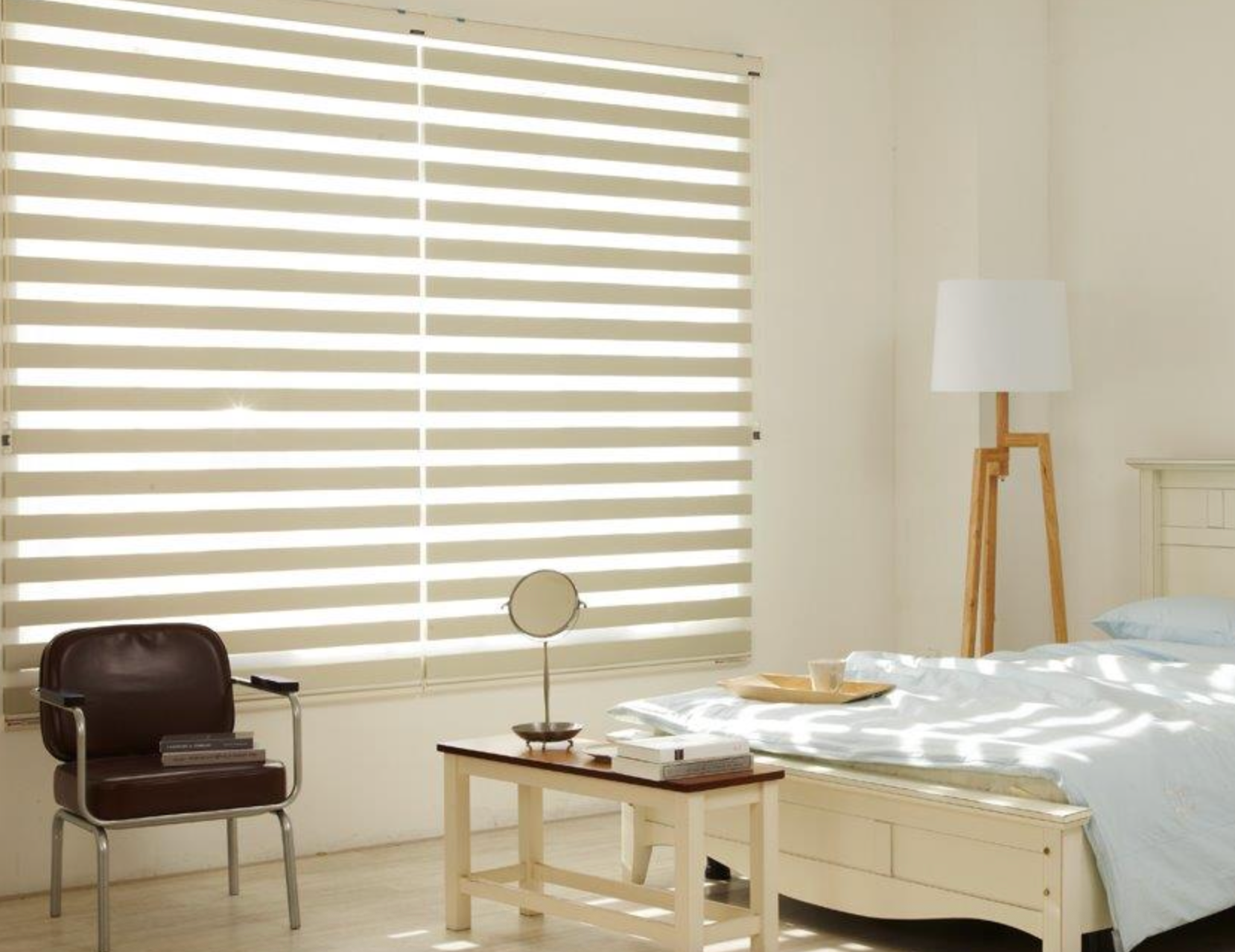 A Kitchen With White Cabinets And Stools And A Clock On The Wall — Mid Coast Flooring & Blinds In Harrington, NSW