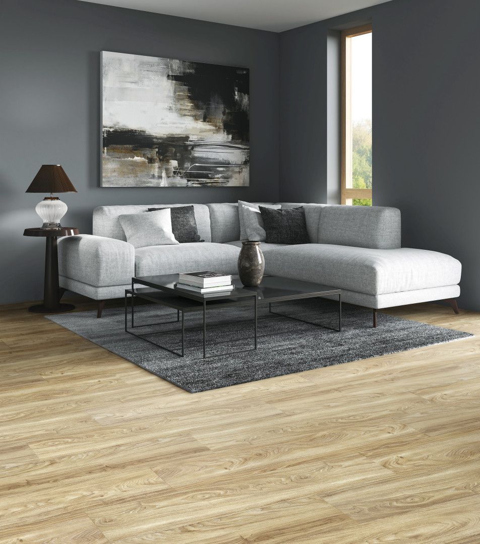Two Pieces Of Wood Are Laying On Top Of Each Other On A Table — Mid Coast Flooring & Blinds In Forster, NSW