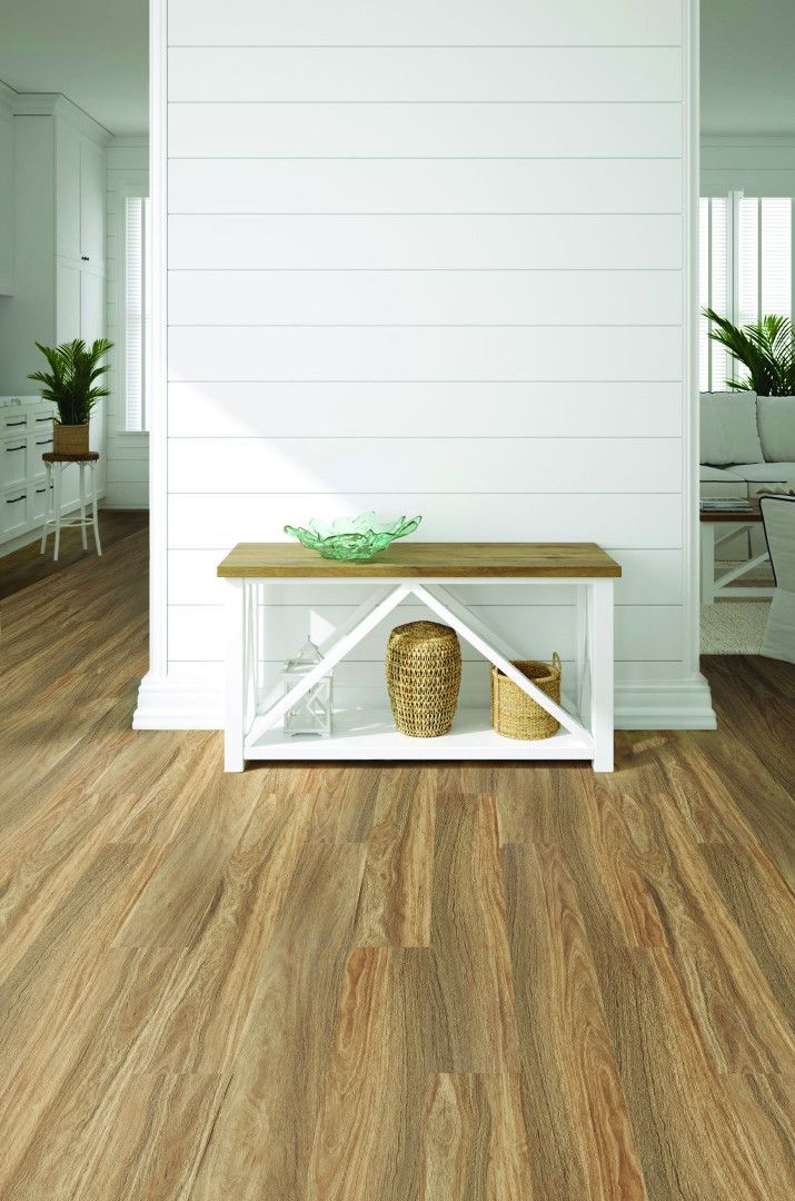 A Wooden Floor In A Living Room With A Dresser And Chairs — Mid Coast Flooring & Blinds In Forster, NSW