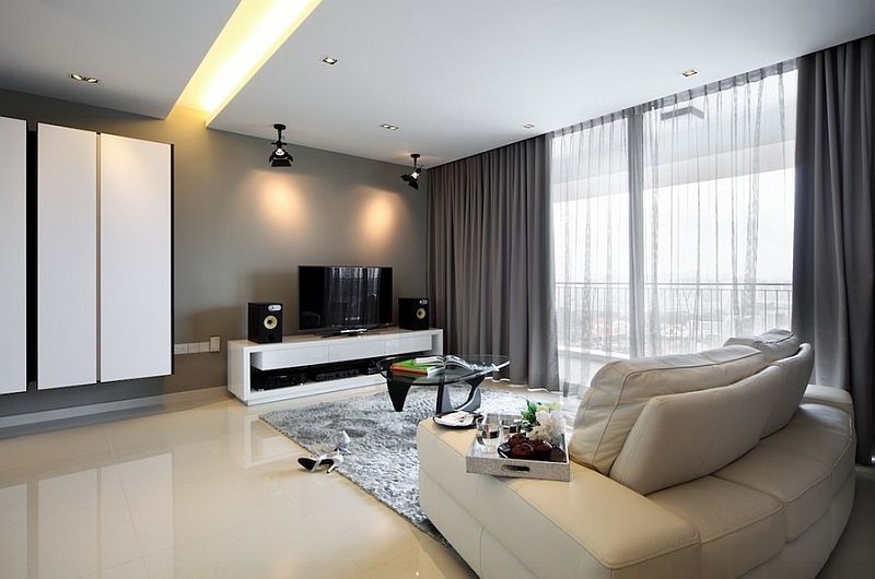 A Living Room With A White Couch And A Flat Screen TV — Mid Coast Flooring & Blinds In Taree, NSW